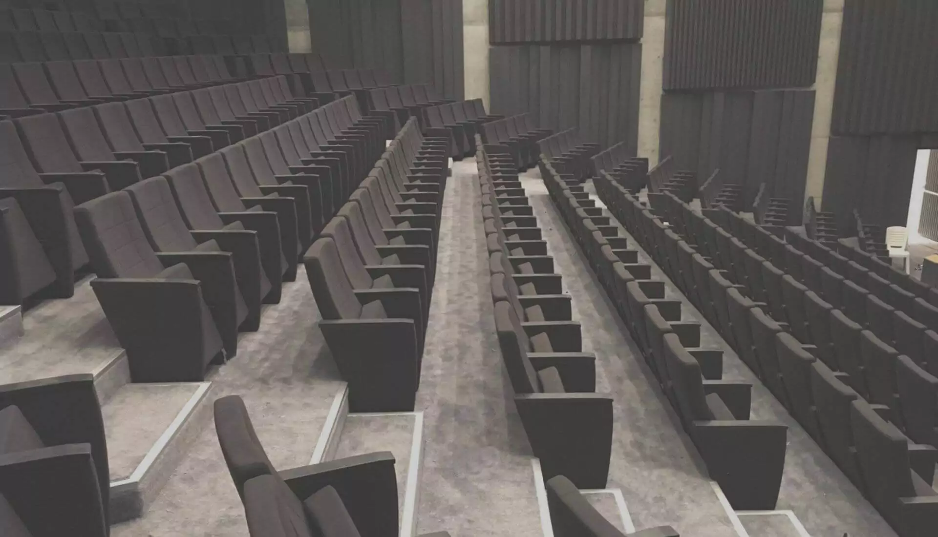 Fire-retardant auditorium seats installed in this venue offer safety and comfort for large audiences. Image